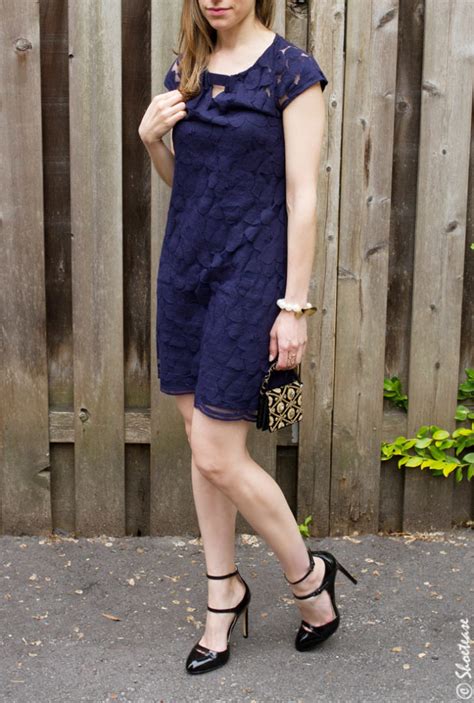 navy dress with black shoes.